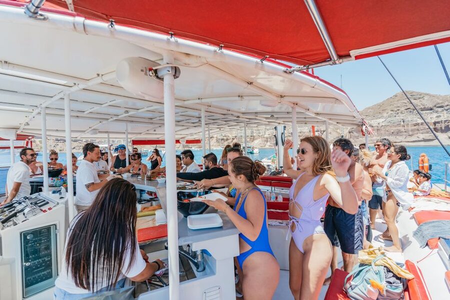 Santorini: Catamaran Tour with BBQ Dinner, Drinks, and Music - Morning cruise or Santorini sunset?
