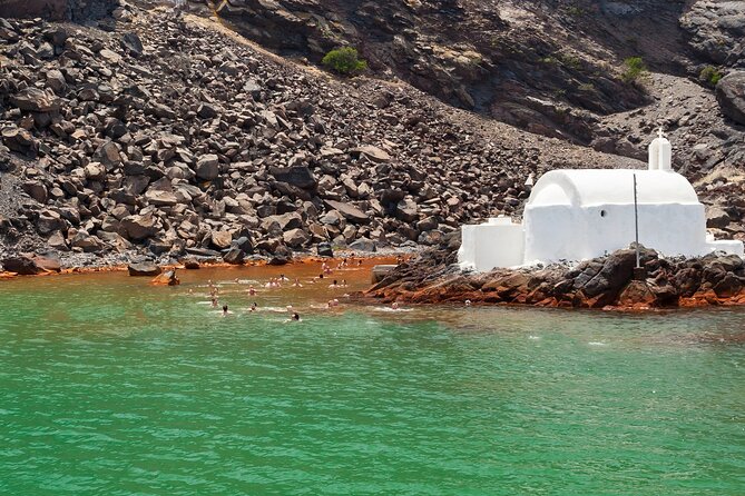 Santorini Classic Catamaran Cruise with BBQ, Drinks and Transfers - Mesa Pigadia, the first real swim