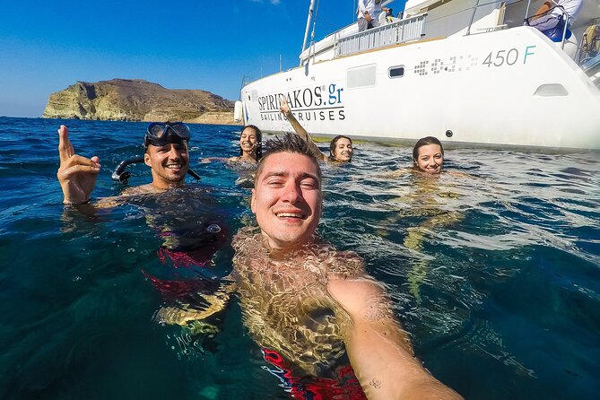 Santorini Classic Catamaran Cruise with BBQ, Drinks and Transfers - BBQ lunch or dinner on the catamaran