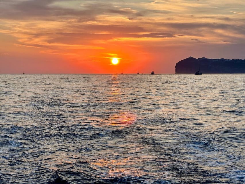 Santorini:Cruises with Catamaran around the Volcanic Island. - Why seeing Santorini from the sea matters