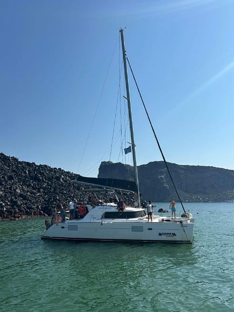 Santorini:Cruises with Catamaran around the Volcanic Island. - The thermal springs are the cruise’s most unusual swim