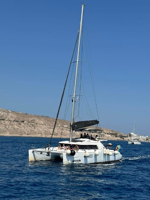 Santorini:Cruises with Catamaran around the Volcanic Island. - Unlimited drinks and the Caldera view improve the value