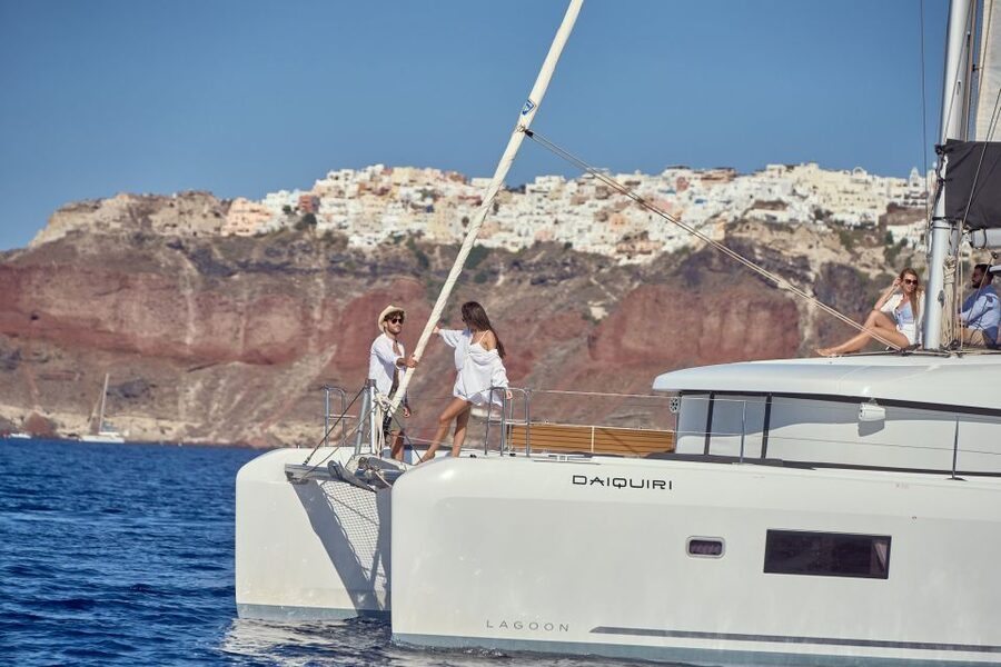 Santorini: Day Luxury Catamaran Cruise with Meal & Drinks - Pickup from your hotel and the ride to Ammoudi Bay