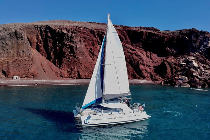 Santorini: Full-Day Catamaran Cruise, with Food|Drinks - The sunset return to Santorini