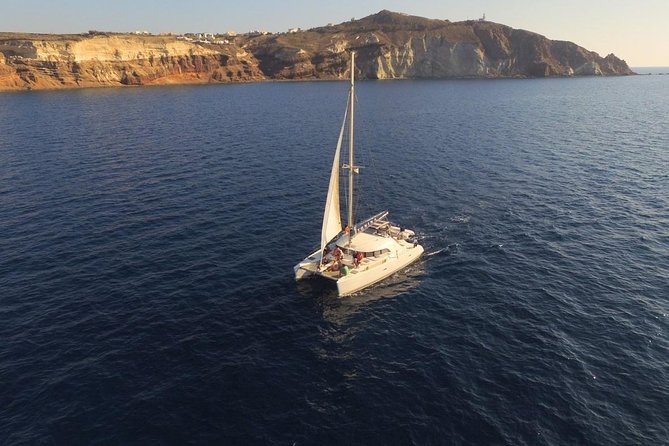 Santorini Full Day Catamaran Private Cruise incl. Meal, Drinks & Free Transport - Mesa Pigadia, swimming, and the best part of the day