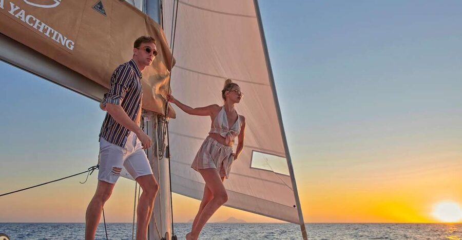 Santorini Gold Catamaran Cruise with Snorkel, BBQ & Open Bar - White Beach and the Venetian lighthouse