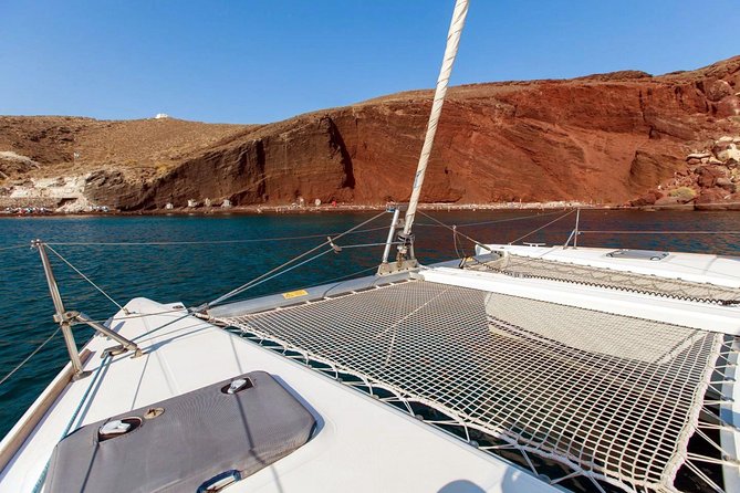 Santorini Half Day Catamaran Private Cruise incl. Meal, Drinks & Free Transport - Palia Kameni, hot springs, and the volcano