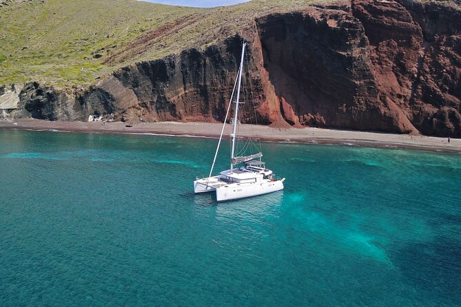 Santorini: Luxury Catamaran Cruise with Fresh Fish BBQ & Drinks - Mesa Pigadia: The Best Swim of the Route