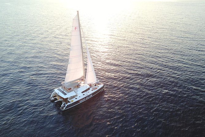 Santorini Luxury Catamaran Day Cruise with BBQ,drinks,transfer - Cruising past the Volcano and Palea Kameni