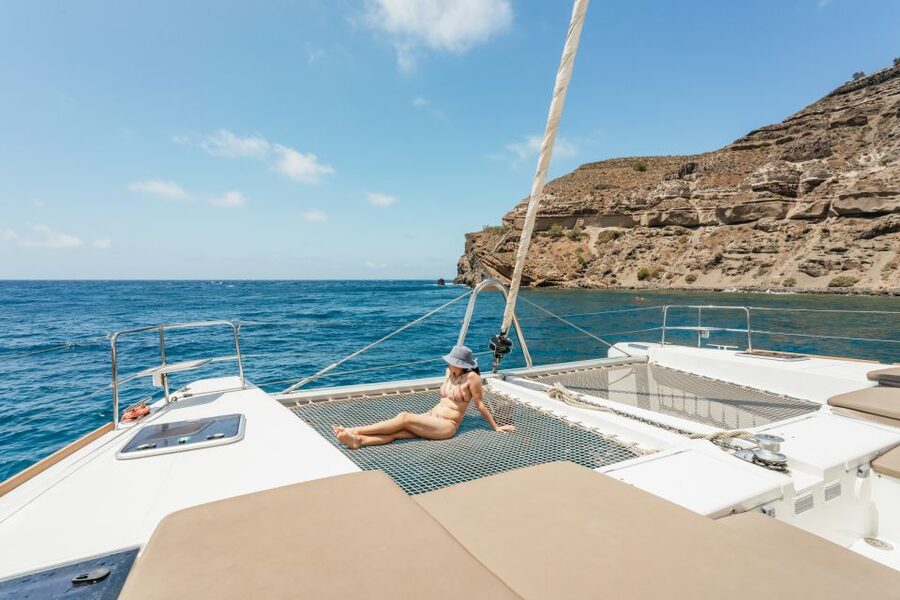 Santorini: Luxury Catamaran Day Trip with Meal and Open Bar - What the $129 price really includes
