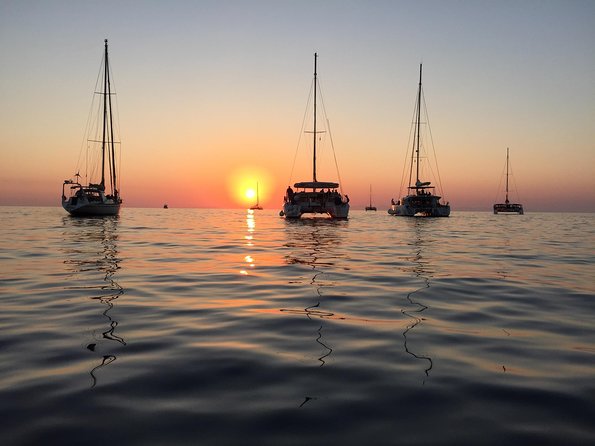 Santorini Luxury Catamaran Sunset Cruise with BBQ, Drink and Transfer - Red Beach from the sea