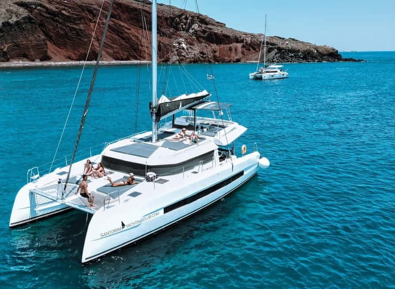 Santorini: Majestic Catamaran Cruise with Meal and Drinks - A comfortable way to see Santorini from the sea