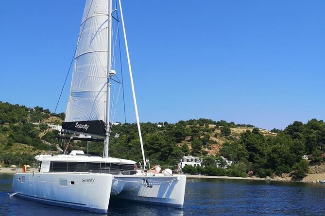 Santorini Oia: Private Sunset Catamaran Cruise with BBQ & Drinks - Thirassia offers a quiet first swim