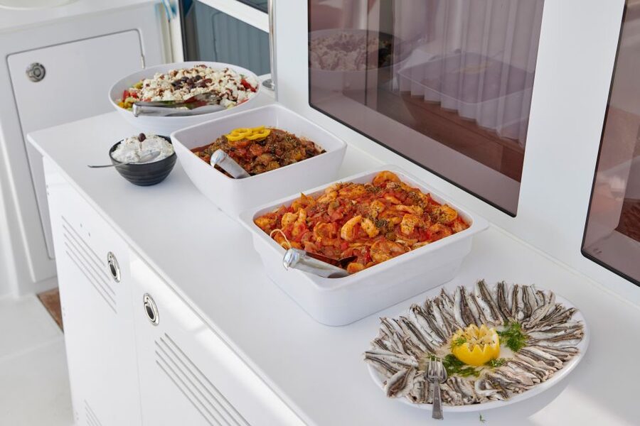Santorini: Platinum Catamaran Cruise w/ BBQ Meal & Open Bar - Red Beach and the southern coast
