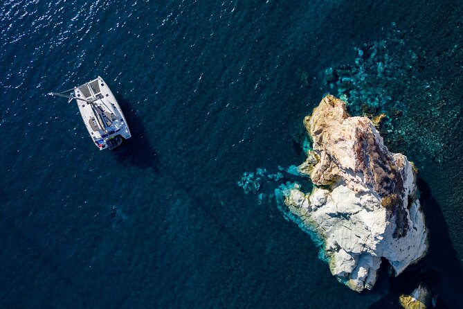 Santorini Platinum Catamaran Cruise with Meal, BBQ and Open Bar - Red Beach and White Beach from the water