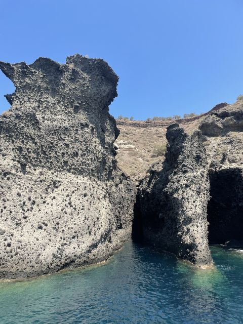 Santorini: Private All-In Catamaran Cruise, with Food|Drinks - Red Beach and White Beach: volcanic scenery up close