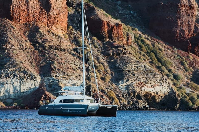 Santorini: Private Catamaran Cruise with BBQ Meal and Drinks - Starting below Oia at Ammoudi Bay