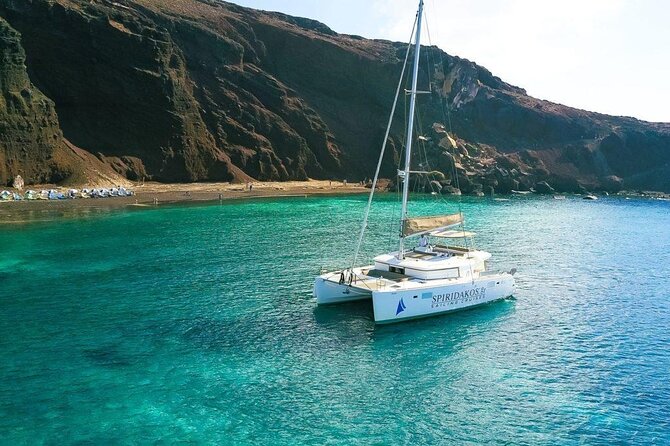 Santorini Private Catamaran Cruise with BBQ, Open Bar & Transfers - Indian Rocks and the caldera cliffs bring the best scenery