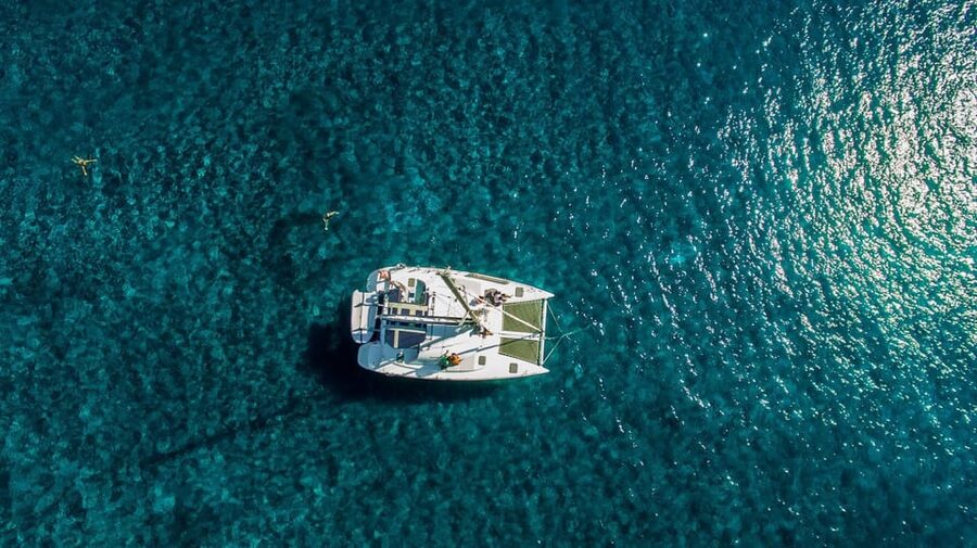 Santorini: Private Catamaran Cruise with Food & Drinks - Why seeing Santorini by boat makes sense