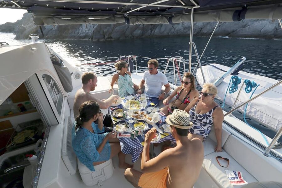 Santorini: Private Catamaran Cruise with Food & Drinks - Lighthouse, Indian Rock, and the view from sea level