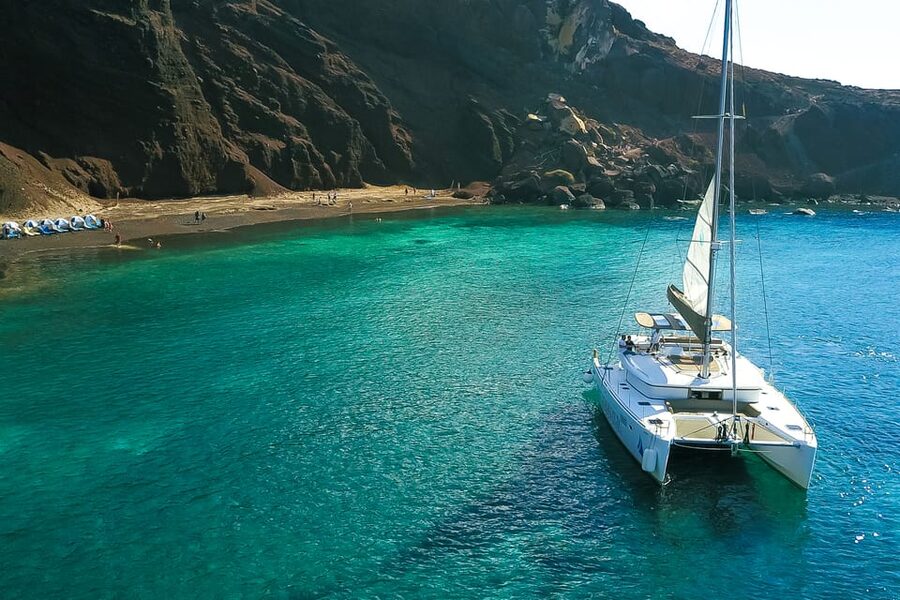 Santorini: Private Catamaran Tour with BBQ Meal and Drinks - Thirasia and the ride back to Thera