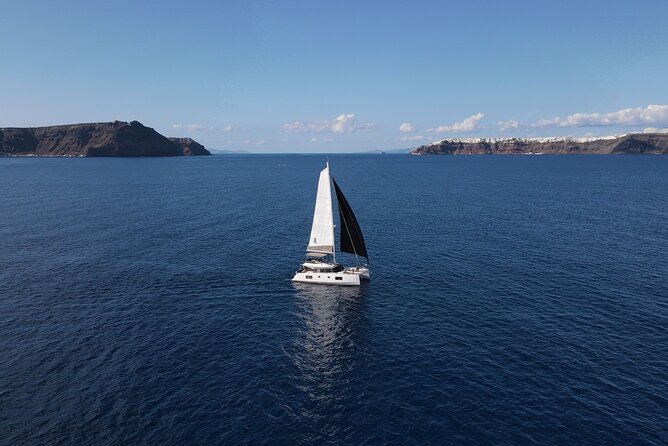 Santorini Private Tour Half-Day Sailing Platinum Catamaran Cruise - Leaving from Vlichada and Getting Set Up