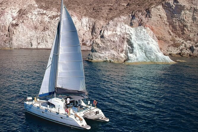Santorini: Standard Small-Group Catamaran Cruise with Food/Drinks - Red Beach and the southern volcanic coast