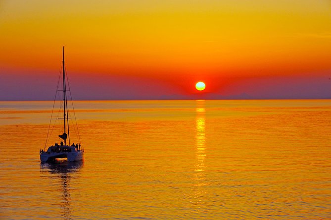 Santorini Sunset Luxury Sailing Catamaran Cruise with BBQ, drinks, transfer - White Beach brings lunch and more time in the water