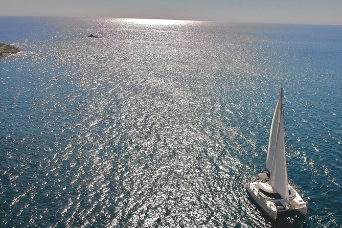Santorini Sunset:Private All-In Catamaran Cruise (Food&Drinks) - Red Beach gives you the first swim