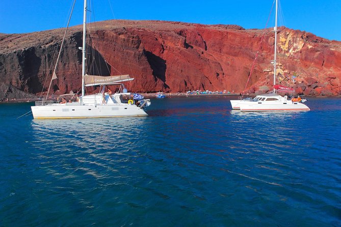 Shared Catamaran Romantic Sunset Cruise from Santorini via Volcano - Greek food, mezedes, and an open bar