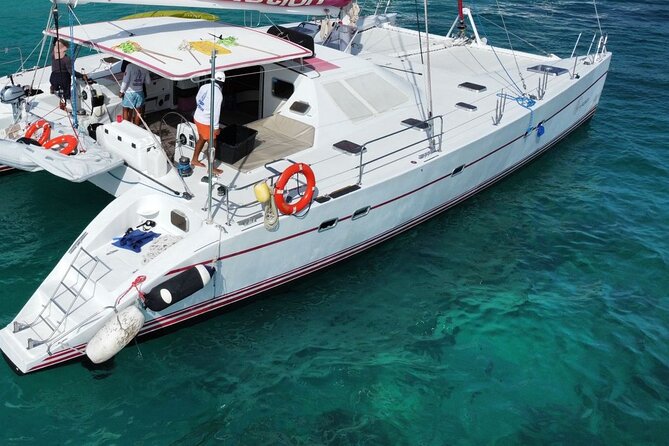 Splendid Isla Mujeres Catamaran: drinks and fun all day! - The Golden-Hour Return Sail