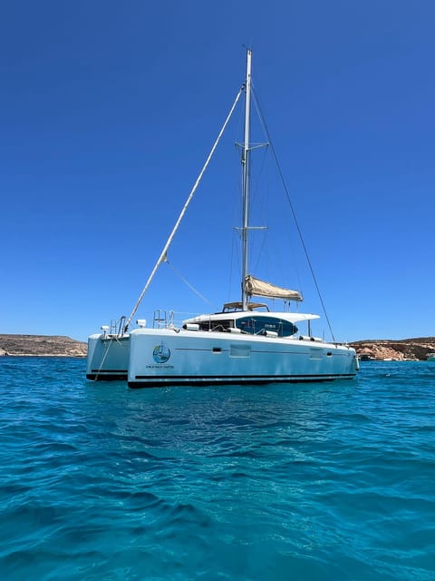 St. Paul's Bay: Half-Day Scenic Catamaran Tour with Drinks - Santa Maria Caves from the water