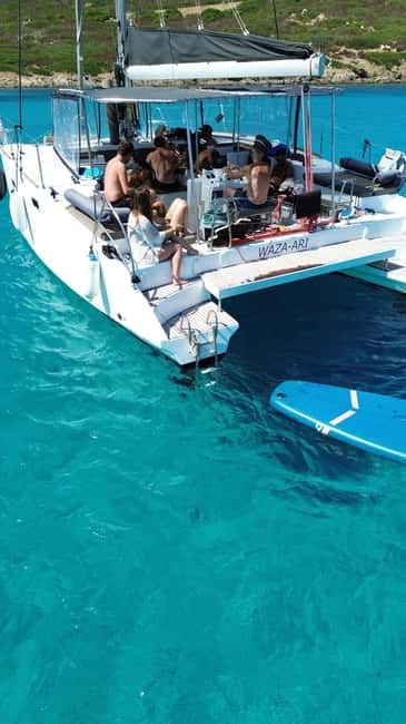 Stintino: full day tour catamaran Asinara Island - Swimming, snorkeling, and time between stops