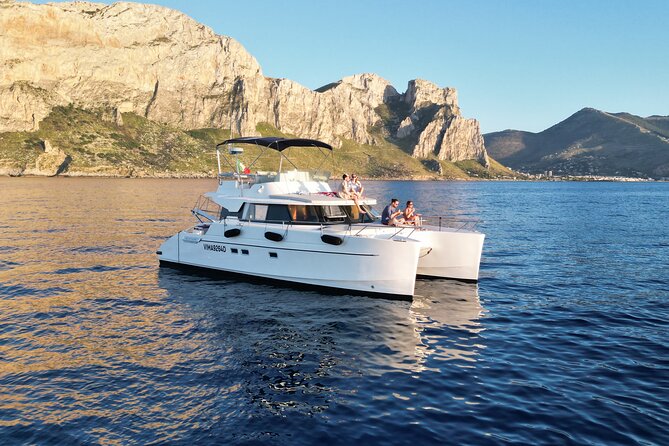 Sunset catamaran tour: Aperitif on the boat in Palermo - Mondello brings the first swim