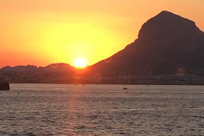 Sunset in Dénia from the Catamaran Mundo Marino - Cava, music, and the atmosphere on board