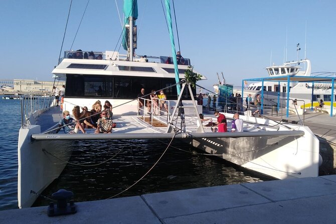 Sunset or night catamaran tour from Malaga - Sunset, cava, and the changing mood onboard