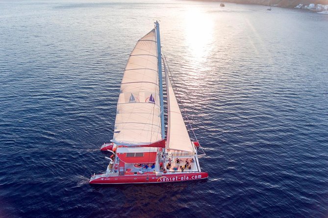 Sunset Sailing Catamaran Cruise in Santorini with BBQ and Drinks - White Beach, swimming, and the BBQ
