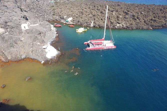 Sunset Sailing Catamaran Cruise in Santorini with BBQ and Drinks - Sunset near Oia, and the question of timing