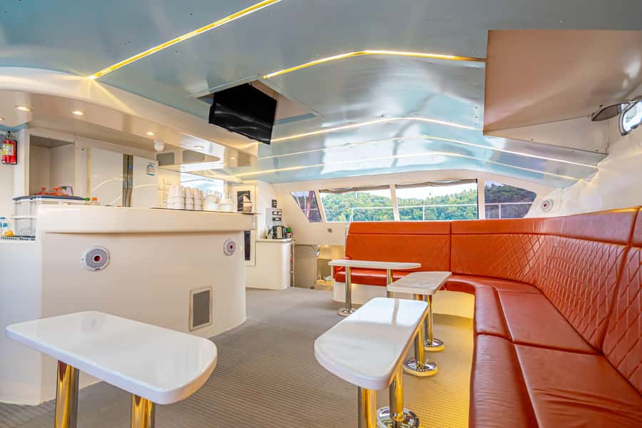 SUNWIND Phuket: Coral and Racha Islands Catamaran Tour - Coral Island brings sand, swimming, and lunch