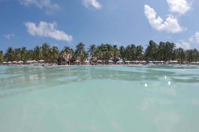 The Best Catamaran tour to Isla Mujeres with Open Bar and Lunch - Lunch and useful beach-club facilities on Isla Mujeres