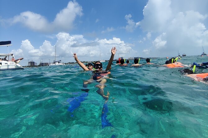 Top Isla Mujeres Catamaran Tour with Snorkel Open Bar and Buffet lunch - Starting in Cancun and getting to the marina