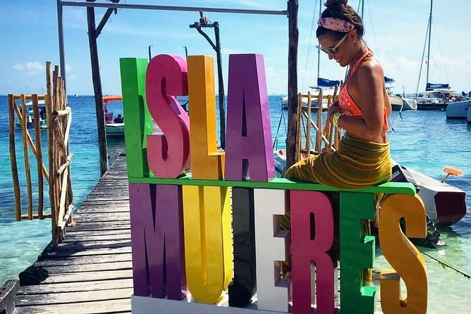 Tour in a Catamaran to Isla Mujeres with all included for the best price! - Arriving at Isla Mujeres and reaching the beach club