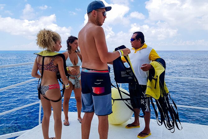 Tour to Cozumel by Catamaran with Snorkeling and Buffet Lunch - Boarding the Cozumel catamaran