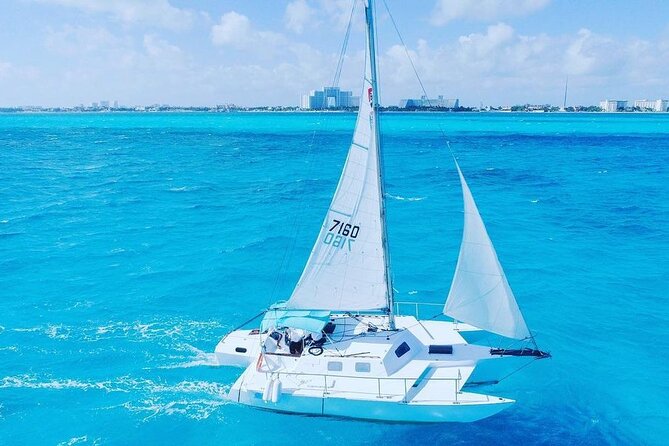Trip to Isla Mujeres by Catamaran, with snorkeling and drinks - Setting sail from Cancun