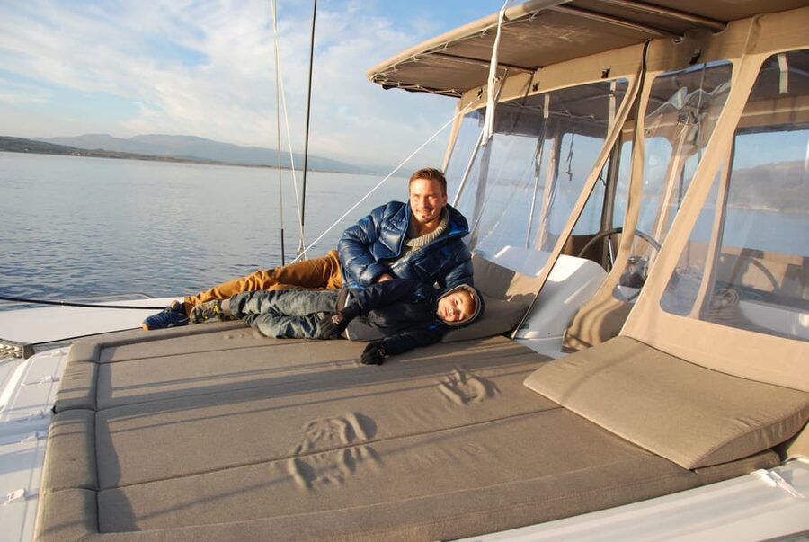 Tromsø: Fjord and Islands Luxury Catamaran Cruise - Thermal suits, deck time, and winter comfort