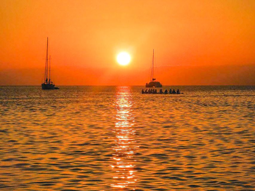 Valencia: Sailing Catamaran Cruise with Sunset Option and DJ - Sunset over the Valencian skyline