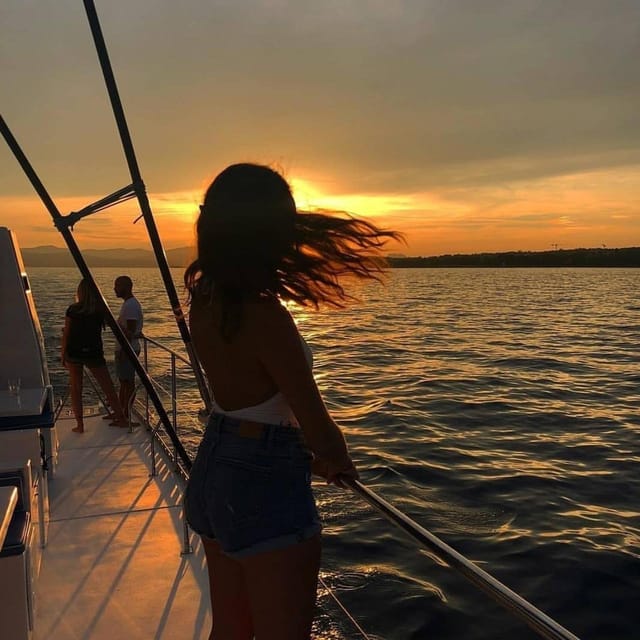 Valencia: Sunset or Daytime Catamaran Cruise with Drink - Leaving the marina and passing the boats