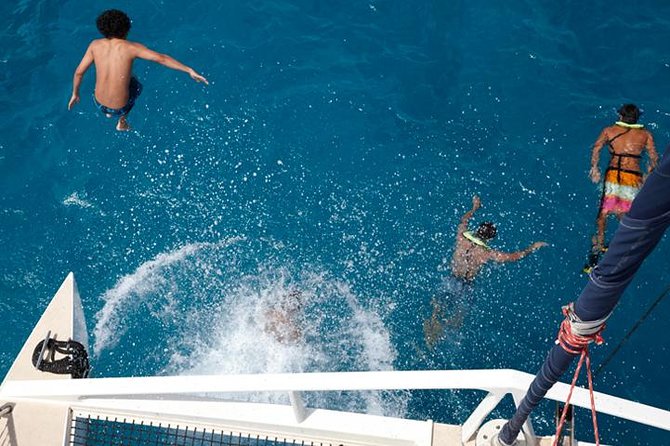 Waikoloa Catamaran Snorkel Sail Including Lunch - Following the Kohala Coast by catamaran