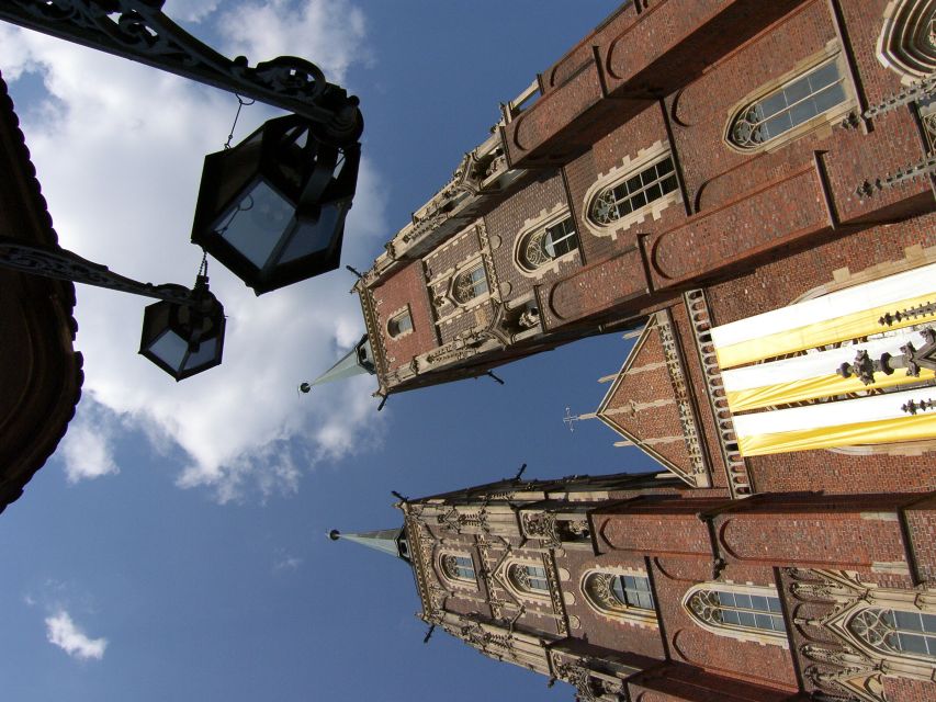 Wroclaw: City Walk and Cruise by Luxury Solar Catamaran - Passing the University of Wroclaw